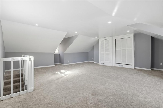 bonus room featuring vaulted ceiling, recessed lighting, carpet, and baseboards