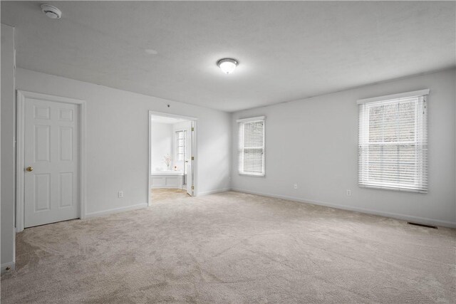 interior space with visible vents and baseboards