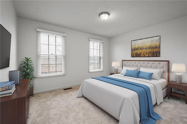 bedroom featuring carpet, visible vents, and baseboards