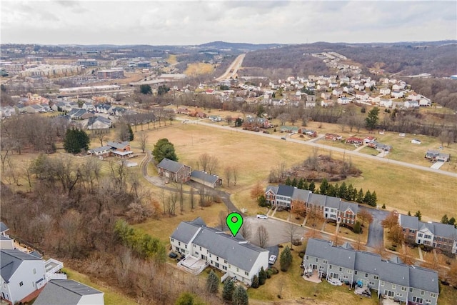 birds eye view of property with a residential view and a mountain view