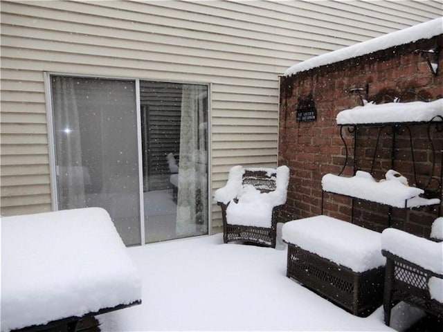 view of snow covered patio