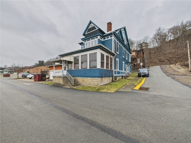 view of front of property with a chimney