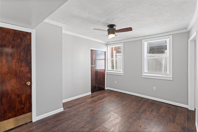 unfurnished bedroom featuring wood-type flooring, baseboards, and crown molding