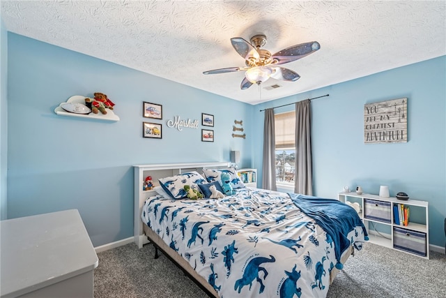 bedroom with carpet, baseboards, ceiling fan, and a textured ceiling