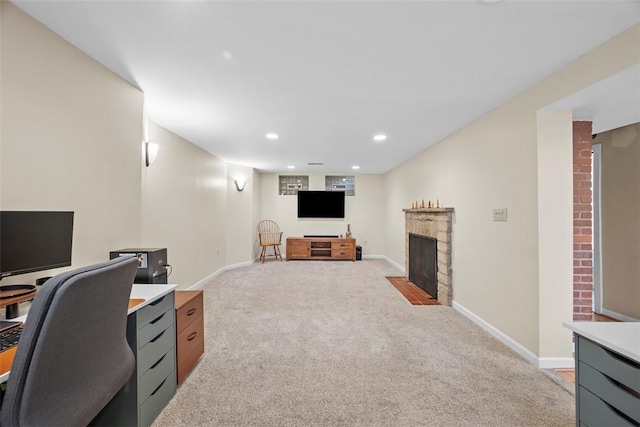 office with light carpet, a brick fireplace, baseboards, and recessed lighting