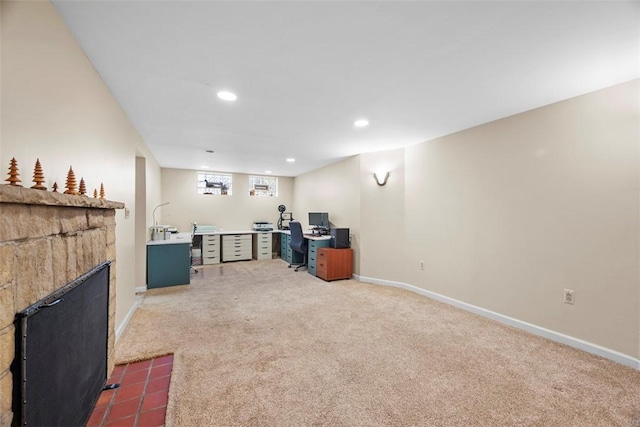 interior space with carpet floors, recessed lighting, a fireplace with flush hearth, and baseboards