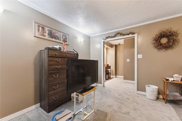 living room featuring baseboards, crown molding, a textured ceiling, and light colored carpet