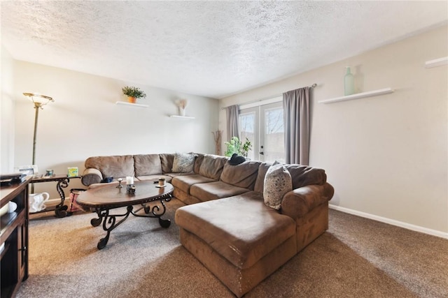 carpeted living area featuring baseboards, a textured ceiling, and french doors