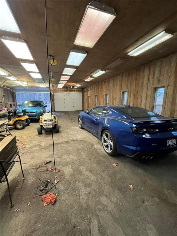 garage with wood walls