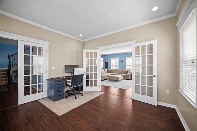 office space featuring crown molding, french doors, dark wood-style flooring, and a healthy amount of sunlight