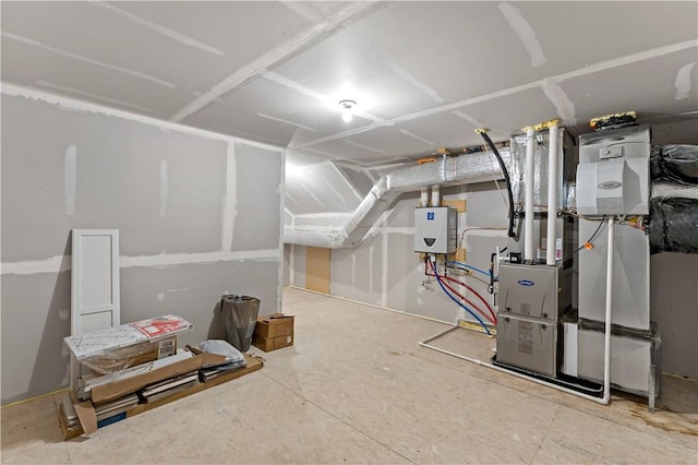 unfinished basement with water heater