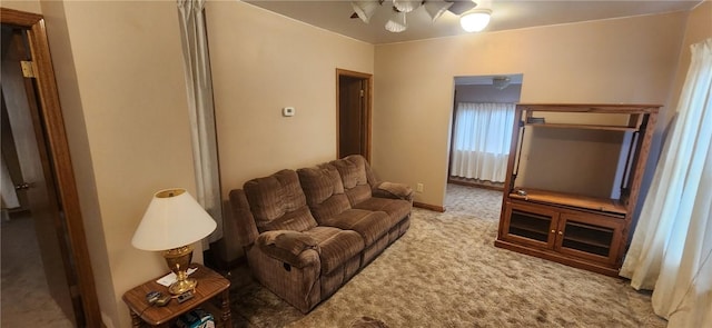 living area with carpet flooring