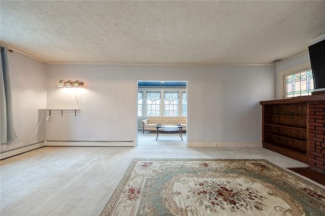 interior space with a textured ceiling, visible vents, carpet flooring, and ornamental molding