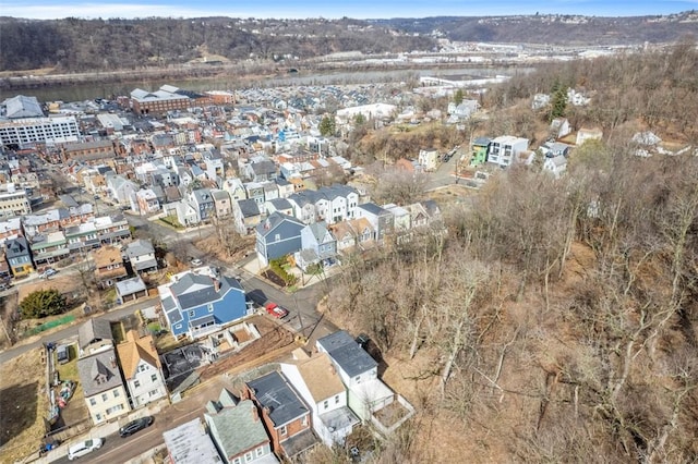 birds eye view of property with a residential view