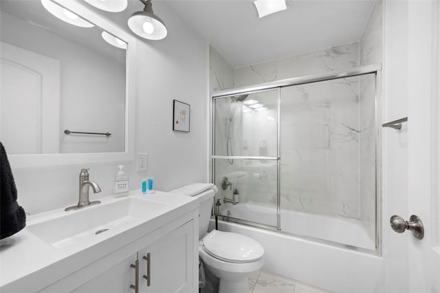 full bathroom with toilet, marble finish floor, enclosed tub / shower combo, and vanity