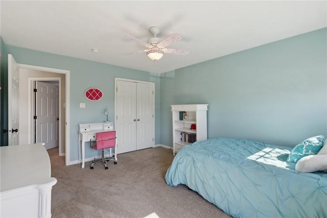 bedroom featuring ceiling fan, carpet floors, a closet, and baseboards