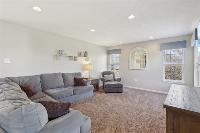 carpeted living room with baseboards and recessed lighting