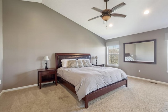 carpeted bedroom featuring recessed lighting, vaulted ceiling, baseboards, and ceiling fan