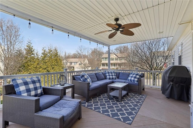 exterior space featuring ceiling fan, area for grilling, and an outdoor living space