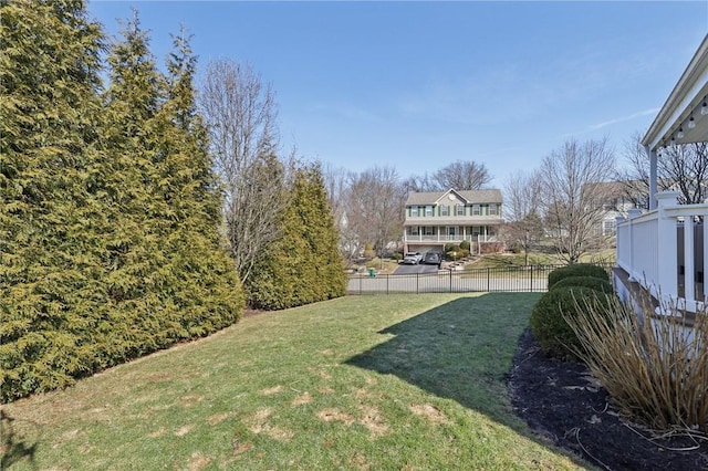 view of yard featuring fence