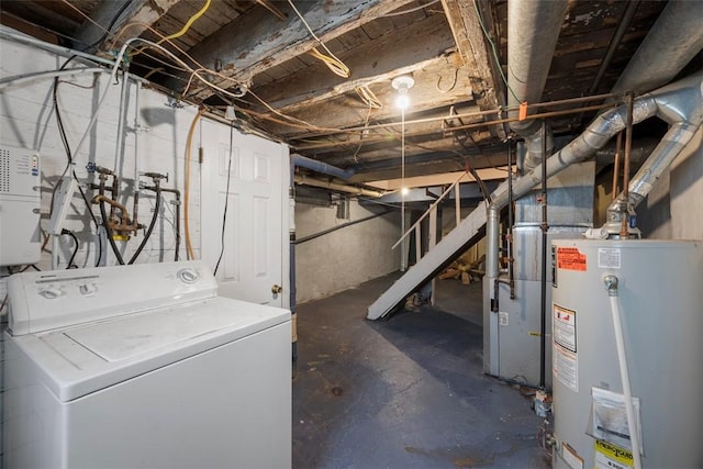 unfinished basement featuring washer / clothes dryer, water heater, and stairway