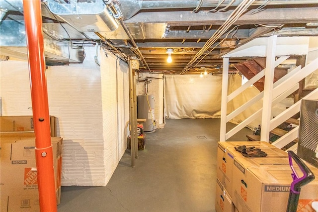 unfinished basement with water heater