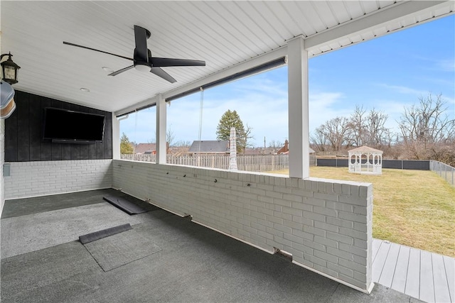 view of patio / terrace with a fenced backyard and a ceiling fan