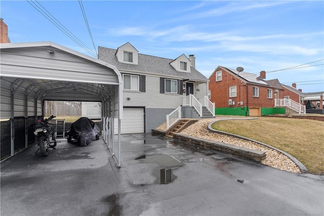 view of front facade with brick siding, fence, driveway, roof with shingles, and a carport