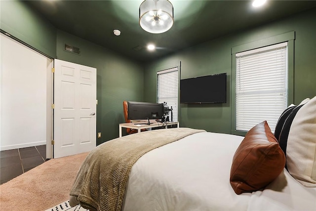 bedroom featuring carpet floors, recessed lighting, and visible vents