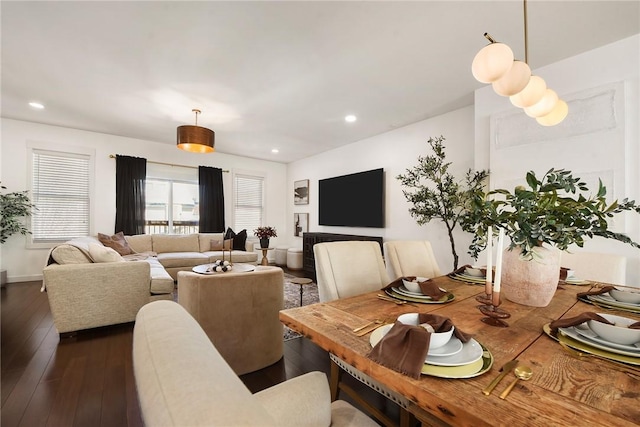 dining room featuring dark wood finished floors and recessed lighting