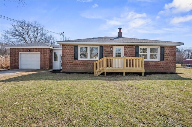 back of property featuring brick siding, a garage, a lawn, and a chimney