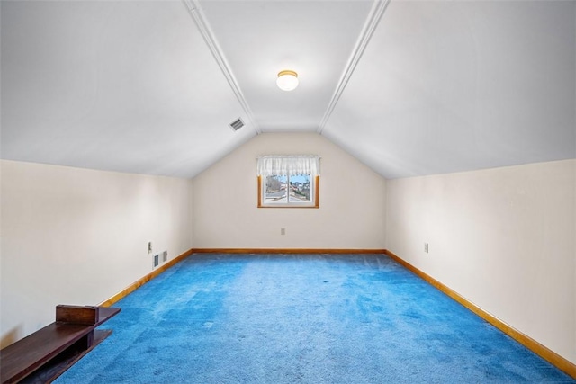 bonus room with lofted ceiling, carpet, visible vents, and baseboards