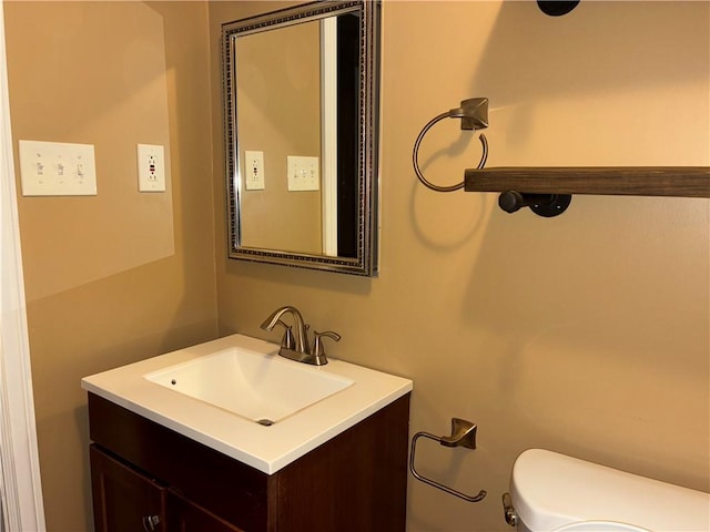 half bath with toilet and vanity