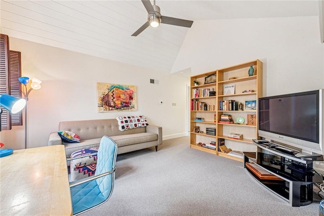 carpeted living area featuring high vaulted ceiling, ceiling fan, and baseboards