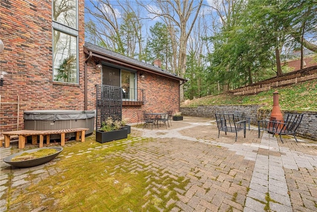 view of patio featuring a hot tub