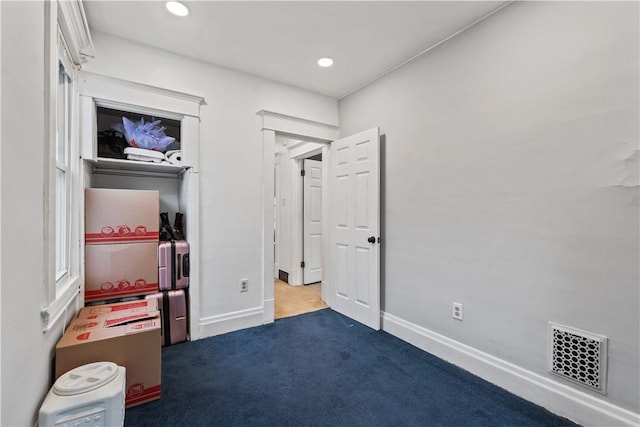 bedroom featuring carpet floors, recessed lighting, visible vents, and baseboards