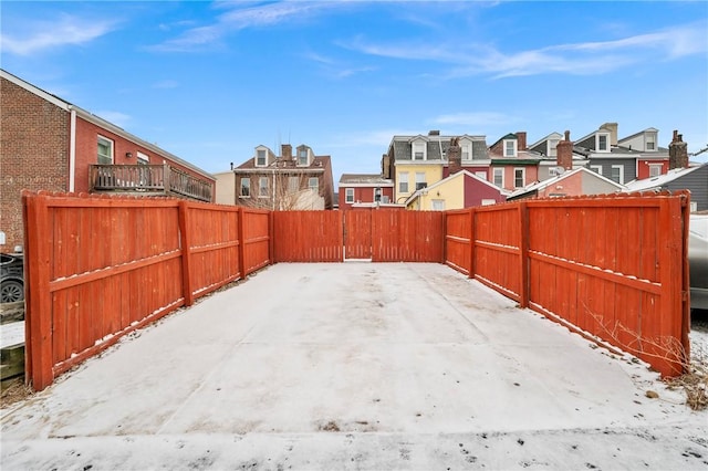 view of patio / terrace with a residential view and a fenced backyard