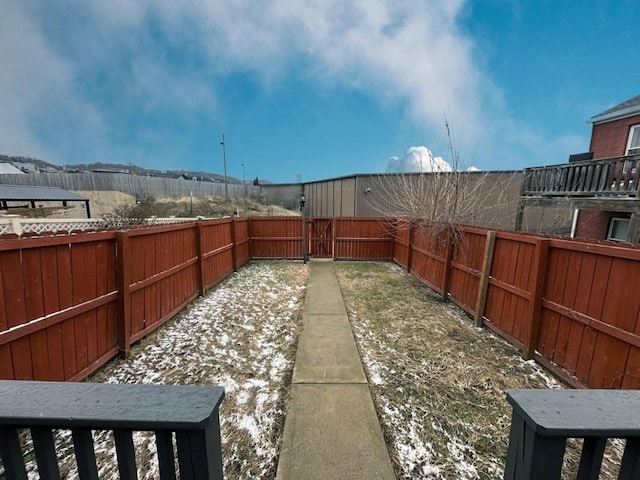 view of yard with a fenced backyard