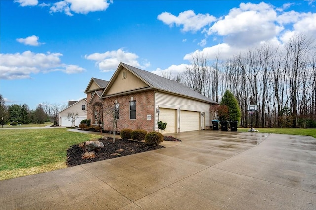 view of home's exterior featuring driveway, an attached garage, a lawn, and brick siding