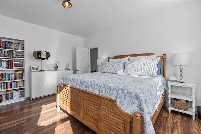 bedroom with wood finished floors