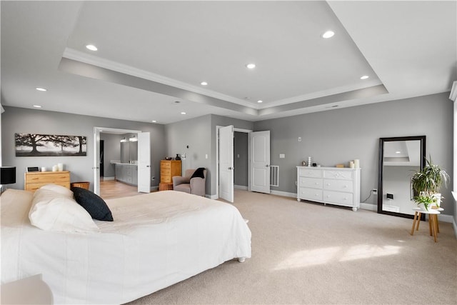 bedroom featuring baseboards, a tray ceiling, light colored carpet, and recessed lighting