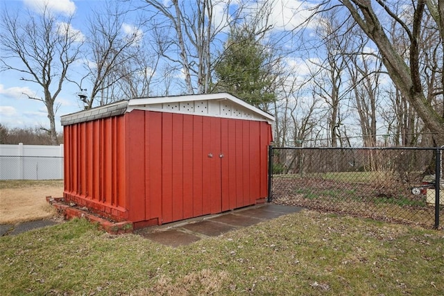 view of shed with a fenced backyard