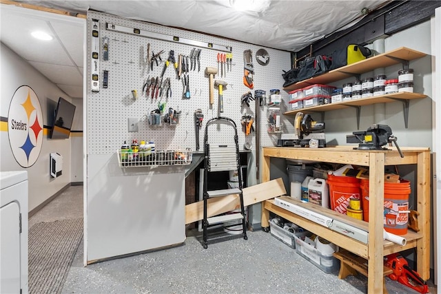 storage room featuring washer / clothes dryer and heating unit