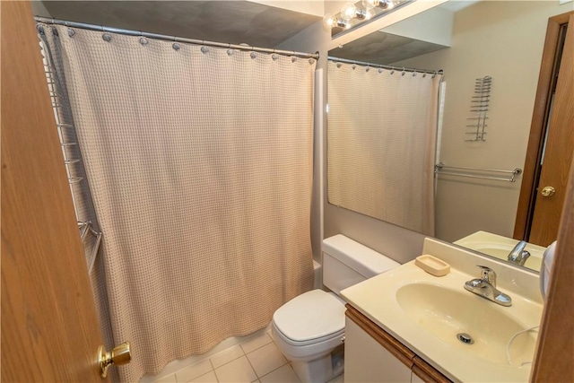 full bath with toilet, vanity, shower / bath combo with shower curtain, and tile patterned floors