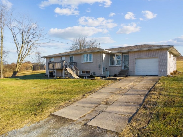 ranch-style home featuring a garage, concrete driveway, brick siding, and a front yard