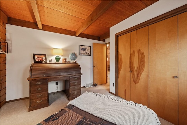 bedroom featuring visible vents, wooden ceiling, beam ceiling, carpet flooring, and a closet