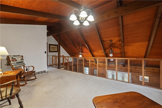 living area with carpet floors, visible vents, lofted ceiling with beams, wood ceiling, and ceiling fan with notable chandelier