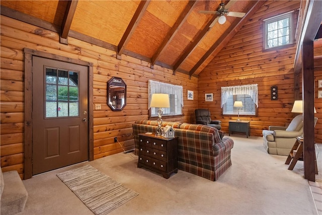 carpeted living room with ceiling fan, high vaulted ceiling, and beamed ceiling