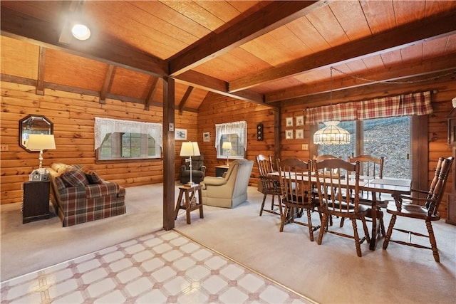 dining area with vaulted ceiling with beams, carpet floors, wooden ceiling, and wooden walls