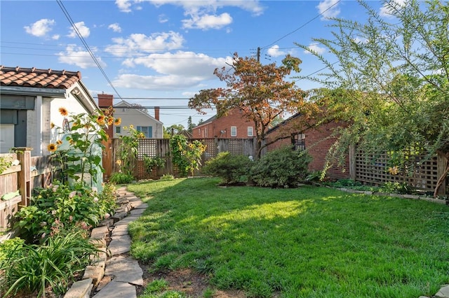 view of yard featuring a fenced backyard